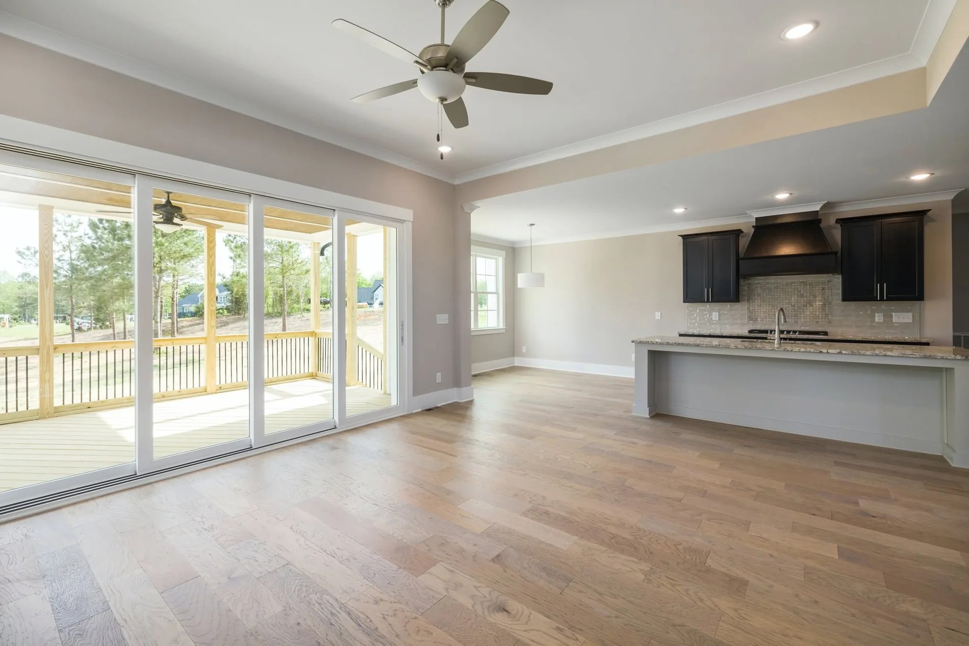 Bright open-plan interior with wood flooring