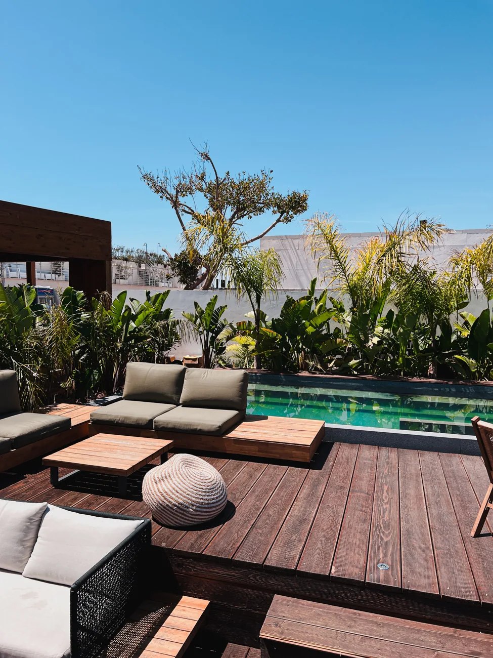 Stylish outdoor timber decking by pool